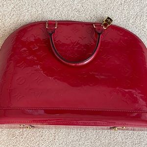 Louis Vuitton Alma GM patent leather bag